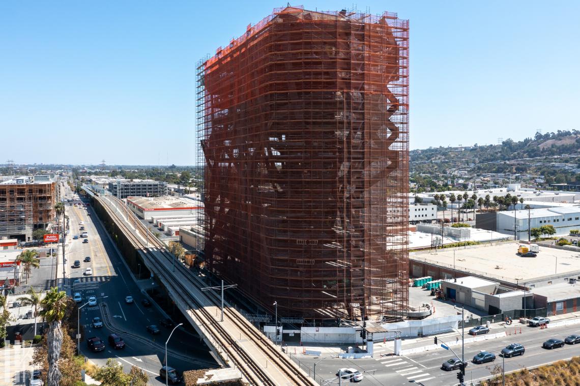 Twisting metal frame of Wrapper office tower completed Urbanize LA